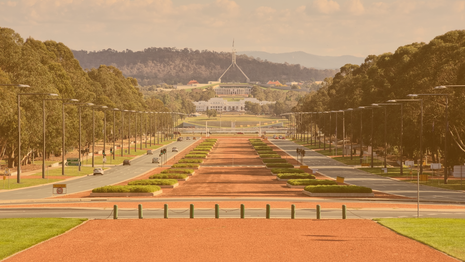 Photo: "ANZAC Parade from the Australian War Memorial, Canberra ACT", by Thennicke, licensed under CC BY-SA 4.0. Hue modified from the original