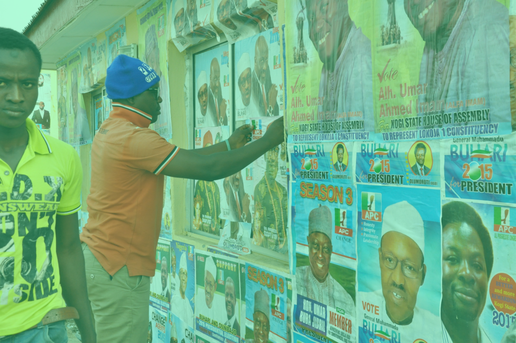Photo: "Wahlkampf in Nigeria 2015", by Heinrich-Böll-Stiftung, licensed under CC BY-SA 2.0. Hue modified from the original