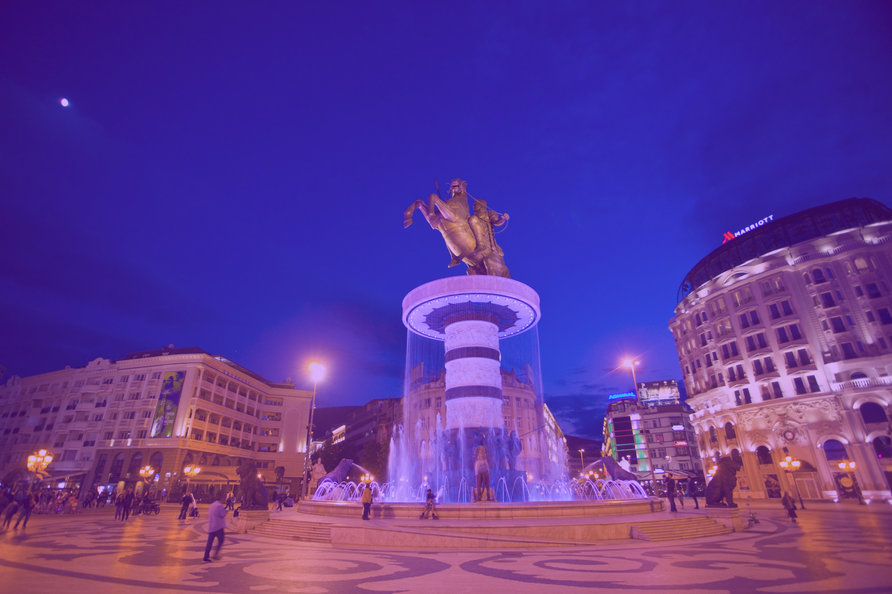 Photo: "Macedonia Square, Skopje", by Mike Norton, licensed under CC BY 2.0. Hue modified from the original