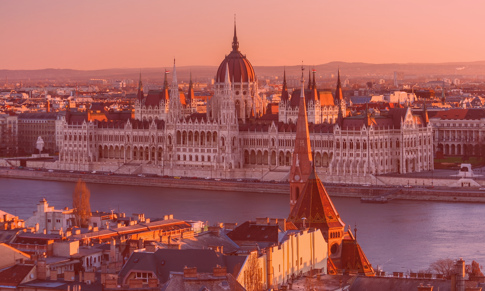Photo: "Budapest: Hungarian Parliament", by Jorge Franganillo licensed under CC BY 2.0. Hue modified from the original