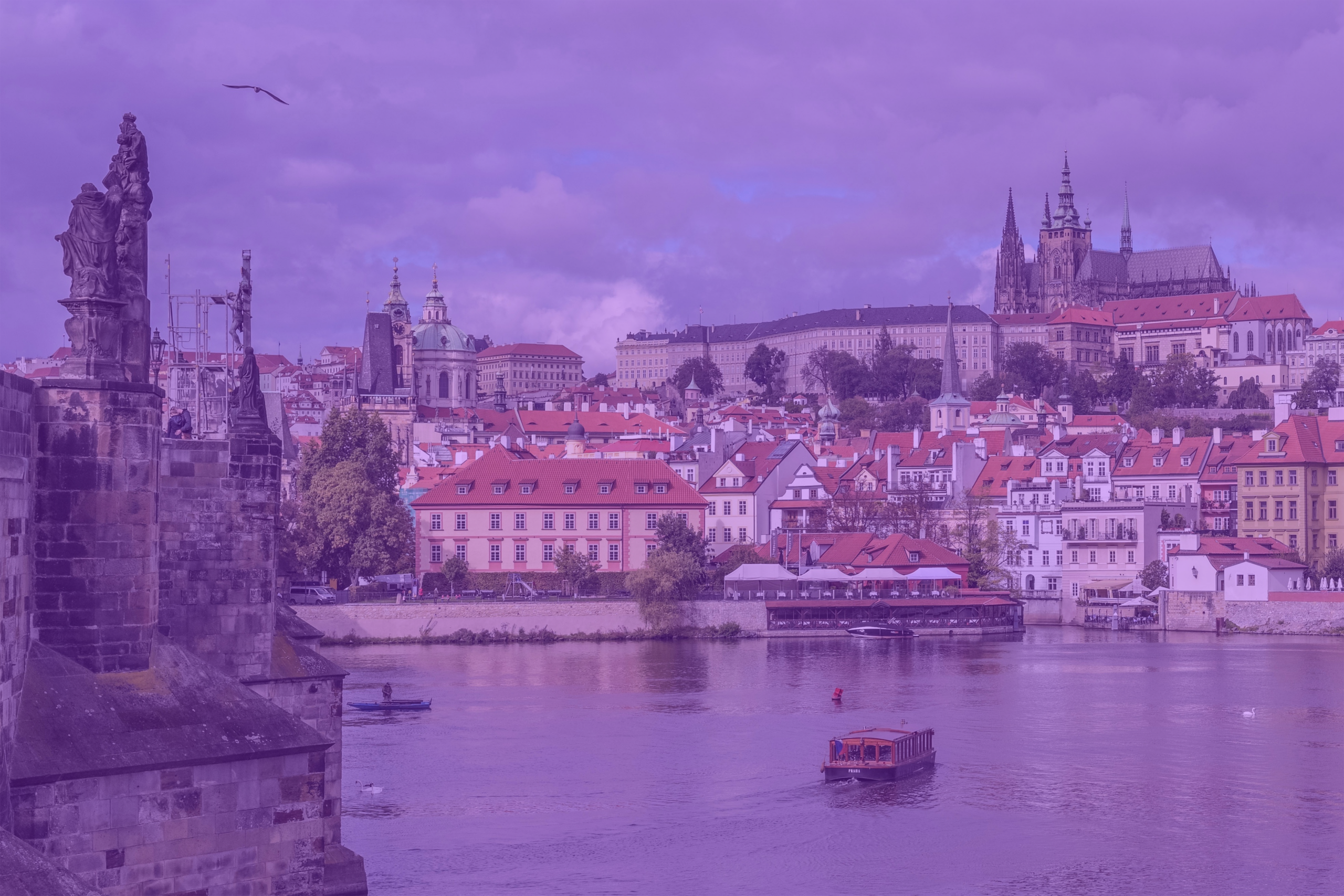 Photo: "Prague - Vue du château depuis le Pont Charles et la Vltava", by Bengt Nyman licensed under CC BY 2.0. Hue modified from the original