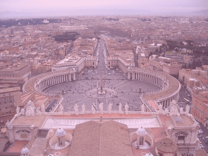 Photo: "Saint Peter's Square from the dome" by velyag, licensed under CC BY-SA 3.0. Hue modified from the original