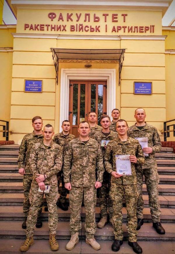 32 Photo posted to the NAA site shows Centuria figures Yuriy Gavrylyshyn (on the left in the front row) and Danylo Tikhomirov (second from right in the middle row) next to t